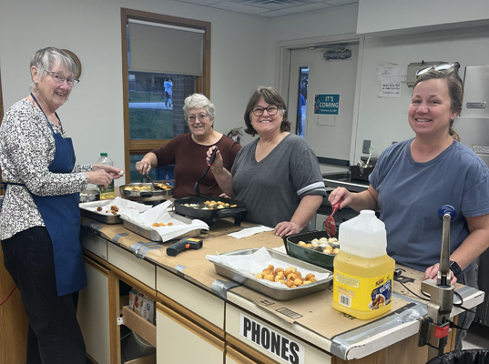 making donuts in the church kitchen