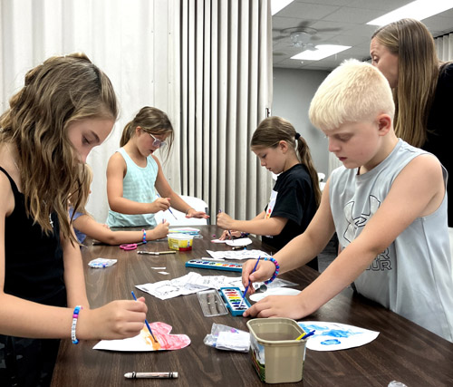 crafts - children paint with watercolors